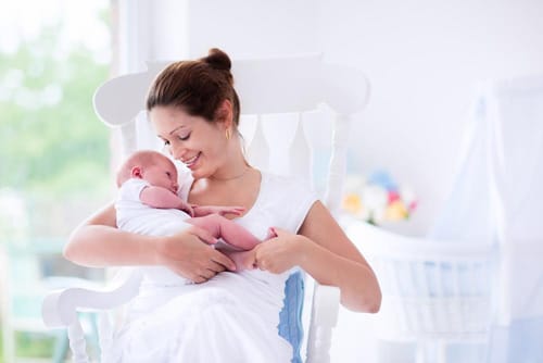 mother embracing baby